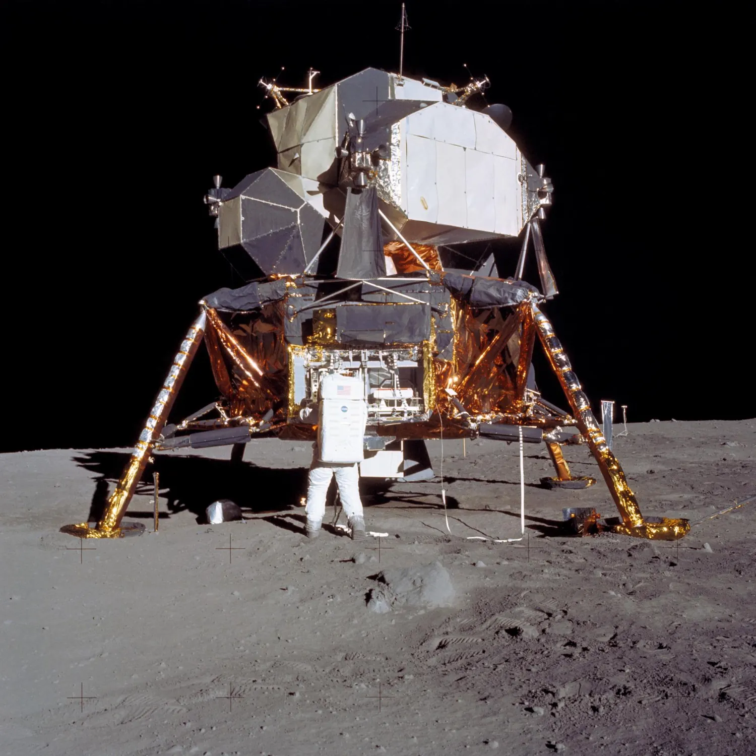 The Apollo 11 lunar module Eagle at rest on the surface of the Moon.